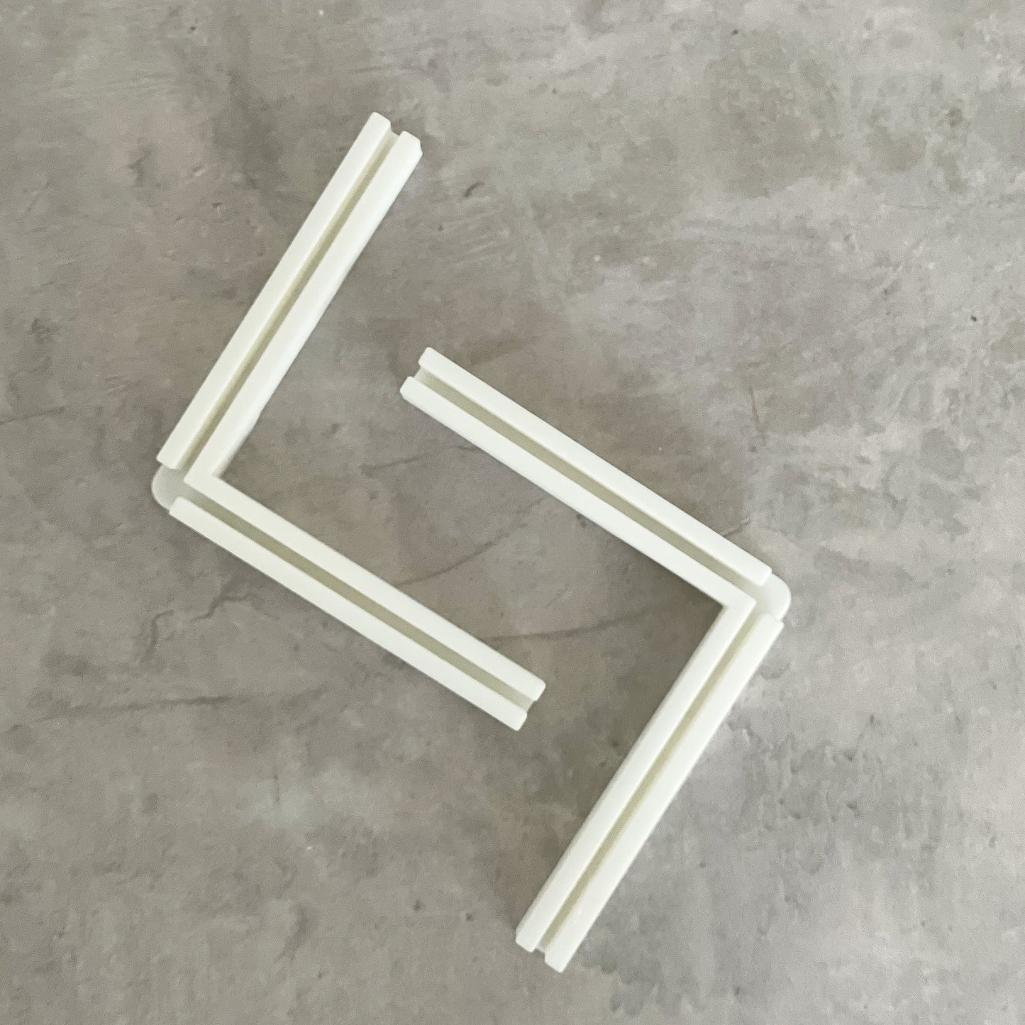 Par de soportes en L